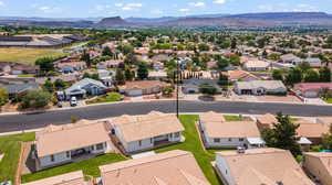 Birds eye view of property with a mountain view