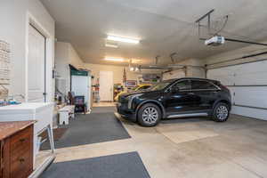 Garage featuring a garage door opener