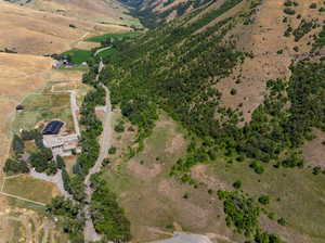 Birds eye view of property featuring a rural view