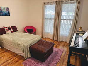 Bedroom featuring hardwood / wood-style flooring