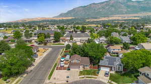 Birds eye view of property with a mountain view