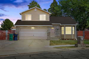 View of front of home featuring a garage