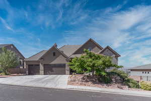 View of front of property featuring a garage