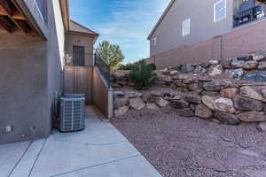 View of yard featuring a patio and central AC unit