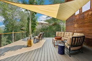 Deck with an outdoor hangout area