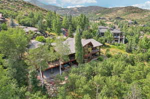 Birds eye view of property with a mountain view