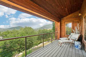 Wooden deck with a mountain view