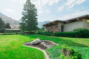 View of yard featuring a mountain view