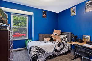 Bedroom featuring carpet