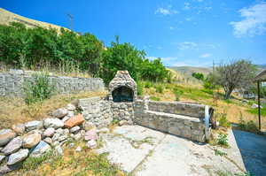 View of patio / terrace featuring a mountain view