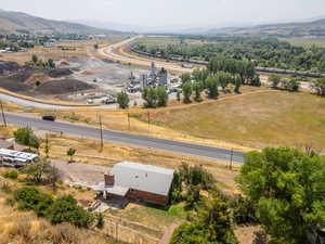 Drone / aerial view with a mountain view and a rural view