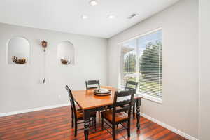 Dining space featuring wood-type flooring