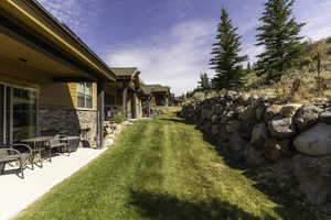 View of yard with a patio