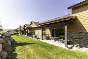 View of yard featuring central air condition unit and a patio