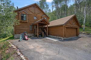 front cabin entrance and attached 2 car garage