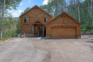 front cabin entrance and attached 2 car garage