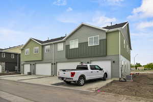 View of front of home featuring a garage