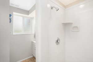 Bathroom with tile patterned flooring and vanity