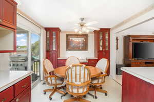 Dining area with ceiling fan