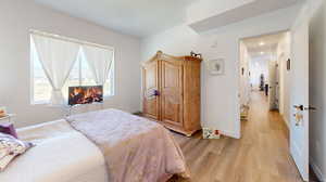 Bedroom featuring light wood-type flooring