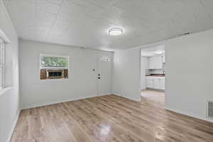 Interior space featuring sink and light hardwood / wood-style floors