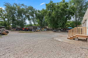 View of yard featuring a storage unit