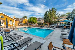 View of pool with a patio area