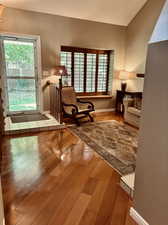 Living area featuring hardwood / wood-style floors