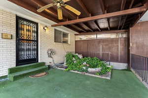 Entrance to property with ceiling fan