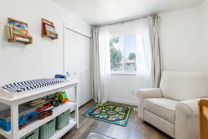 Living area featuring hardwood / wood-style floors