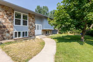 Exterior space with a front yard