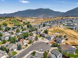 Birds eye view of property with a mountain view