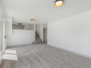 Living room featuring carpet floors