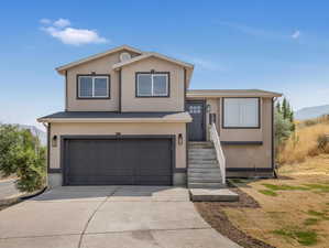 View of front of home with a garage