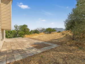 View of yard featuring a patio