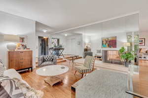 Formal living room featuring a double sided fireplace