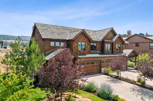 View of front of property featuring a garage