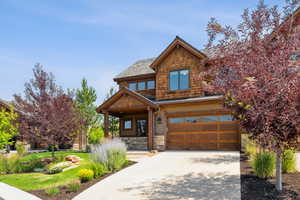 View of front of home featuring a garage