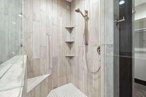 Bathroom with a tile shower