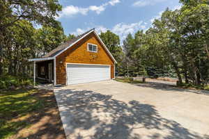 View of front of property featuring a garage