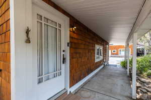 Exterior space with a porch