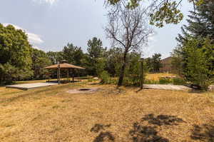 View of yard with a gazebo and a patio area