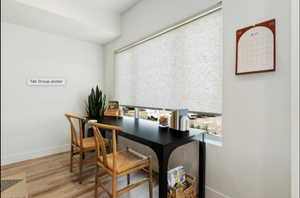 Home office featuring light hardwood / wood-style flooring