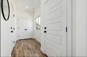 Doorway featuring light hardwood / wood-style flooring