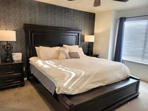 Spacious Main Bedroom with accent wall