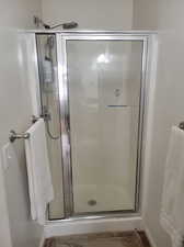 Full Main Bathroom with walk in shower and separate bath.