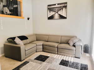 Living room with french doors opening to front porch