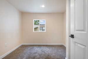 Bedroom featuring carpet flooring