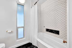 Updated main level bathroom tub/shower