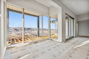 Interior space with a mountain view and plenty of natural light